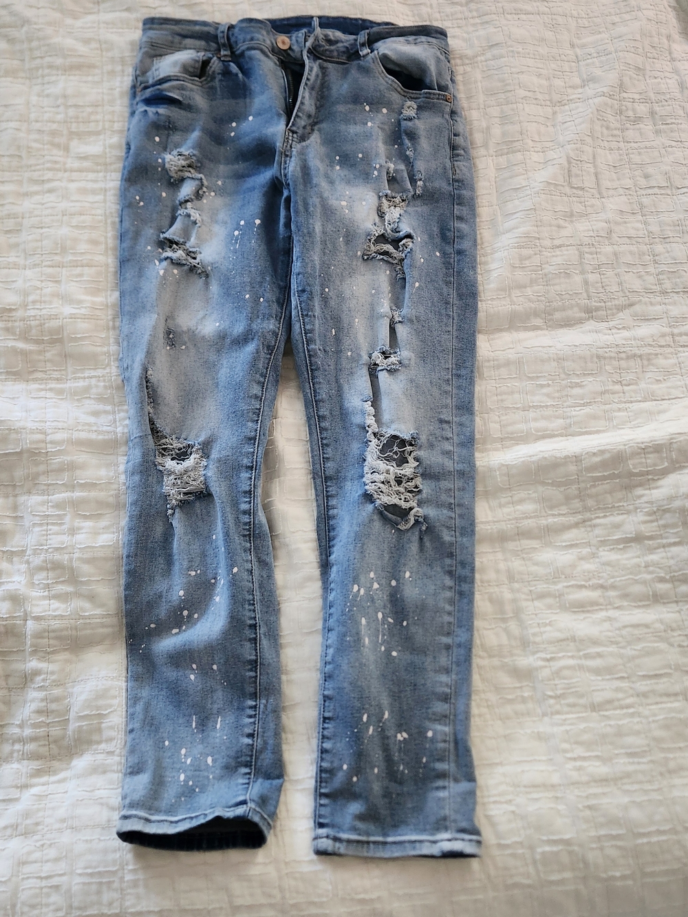 Women’s Distressed Light Blue Jeans